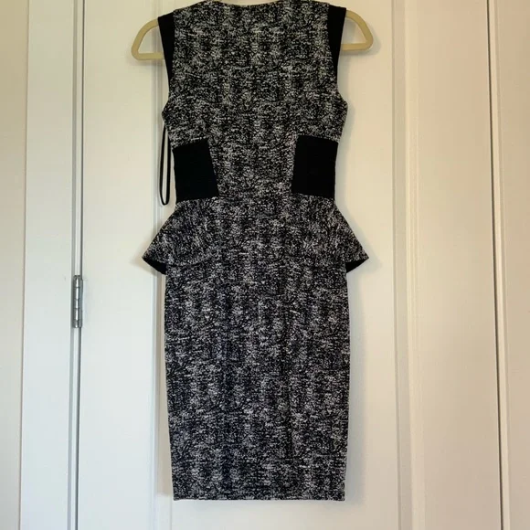 Form-fitted, front zip, peplum tweed dress from BeBe - Picture 2 of 3